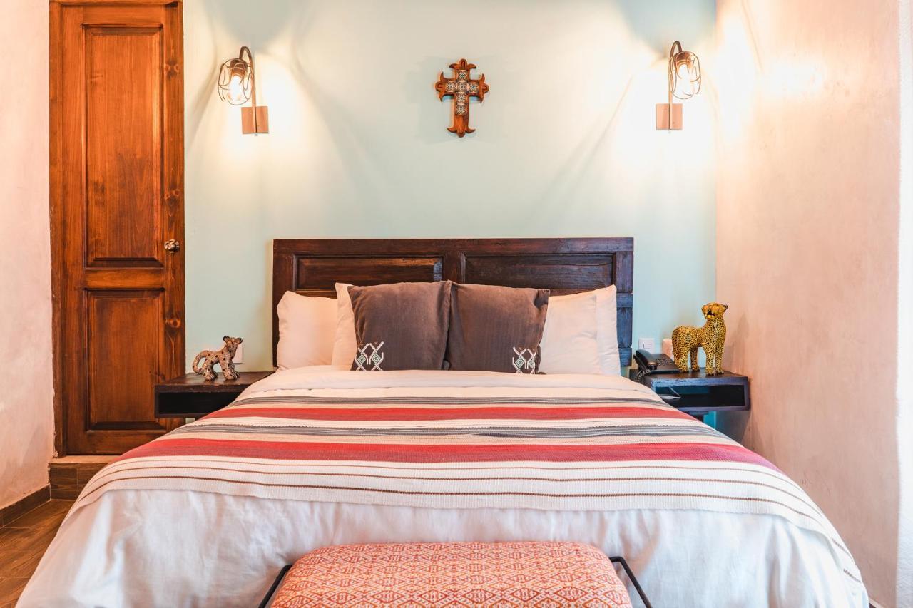 Yox Hotel Boutique San Cristóbal de Las Casas Εξωτερικό φωτογραφία A bedroom at the hotel