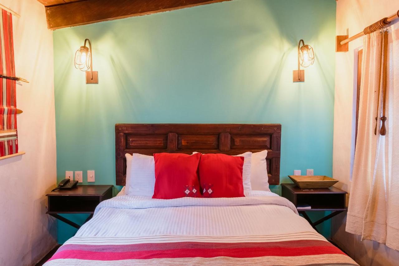 Yox Hotel Boutique San Cristóbal de Las Casas Εξωτερικό φωτογραφία A bedroom at the hotel