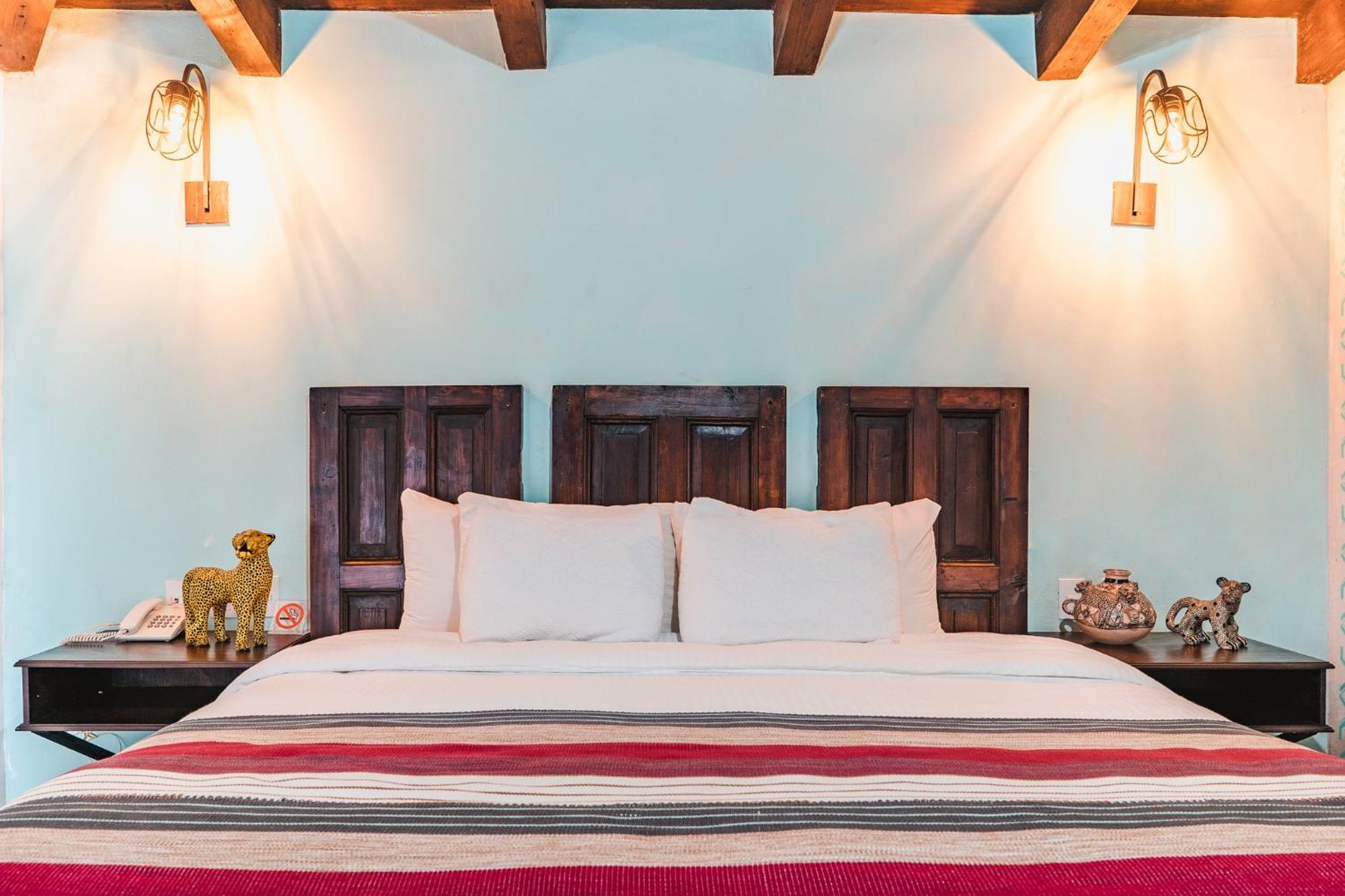 Yox Hotel Boutique San Cristóbal de Las Casas Δωμάτιο φωτογραφία A bedroom at the hotel